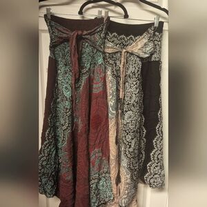 2 Bohemian Style Maxi Skirts sz small. I will wash them in free and clear tide.